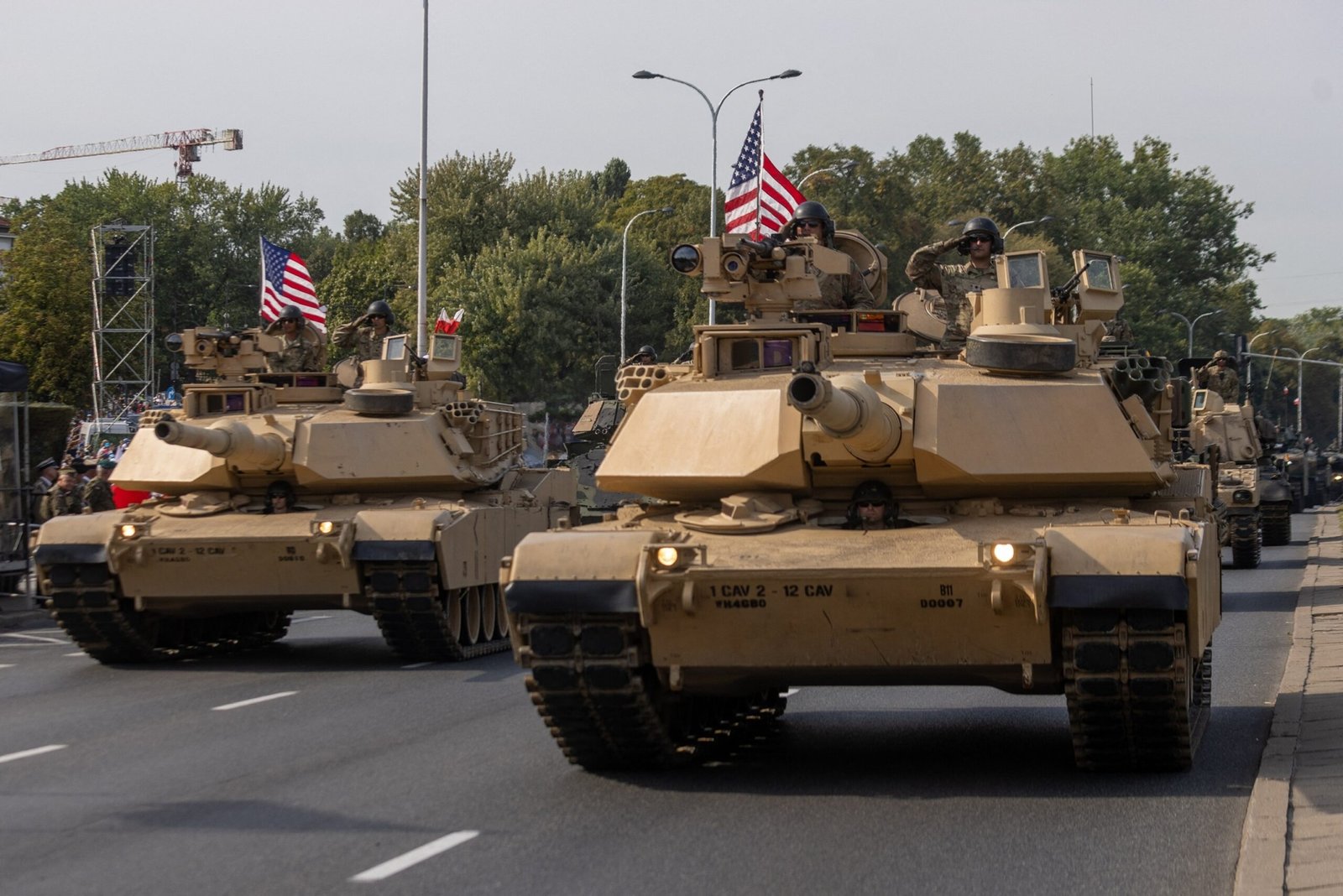 The army begins to prepare tanks for a cross -country trip to DC for a military parade