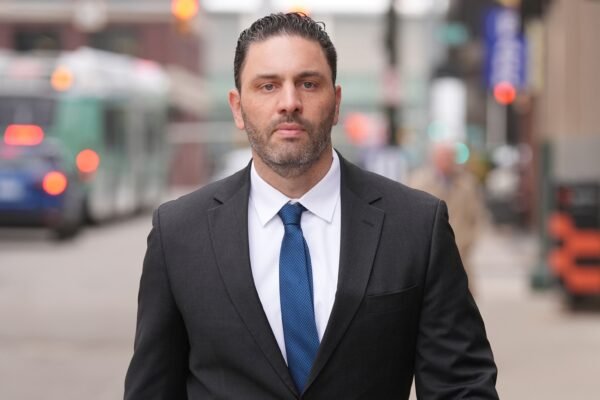 Former Michigan football coach asks judge to dismiss part of hacked images case Former Michigan football coach asks judge to dismiss part of hacked images case