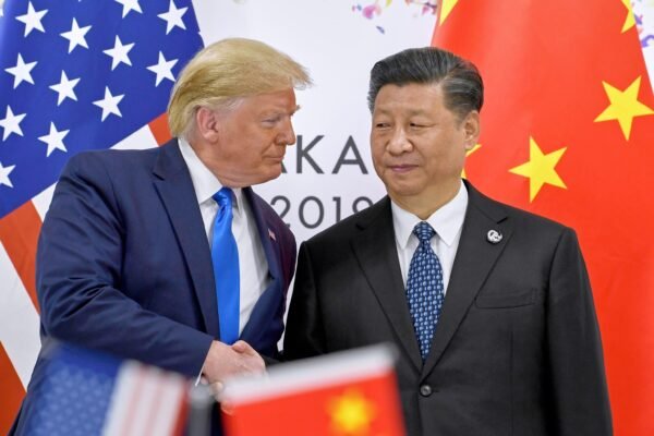 Trump announces new 100% tariff on Chinese imports after stock market sell-off PHOTO: President Donald Trump, left, shakes hands with Chinese President Xi Jinping during a meeting on the sidelines of the G-20 summit in Osaka, western Japan, on June 29, 2019.